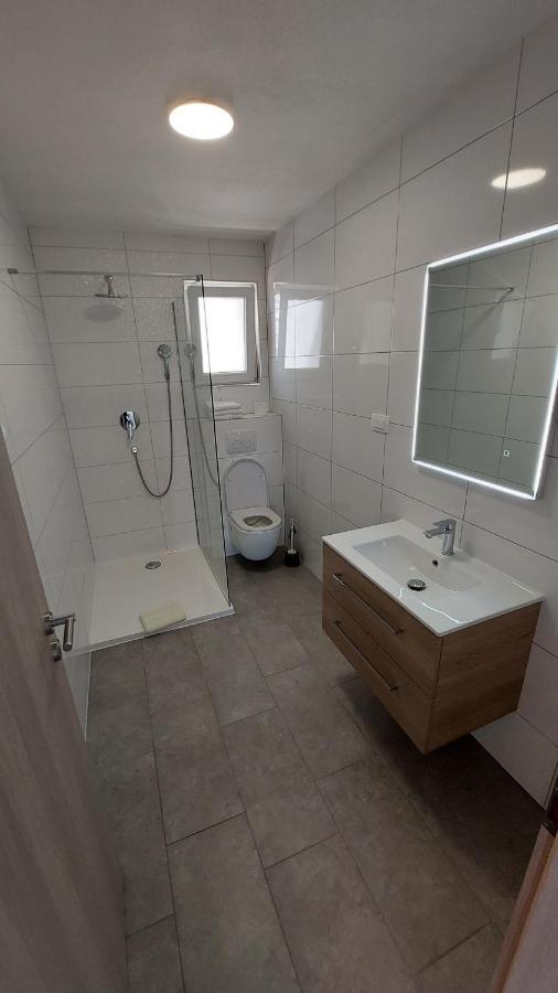 Apartments Babic โตรกีร์ ภายนอก รูปภาพ