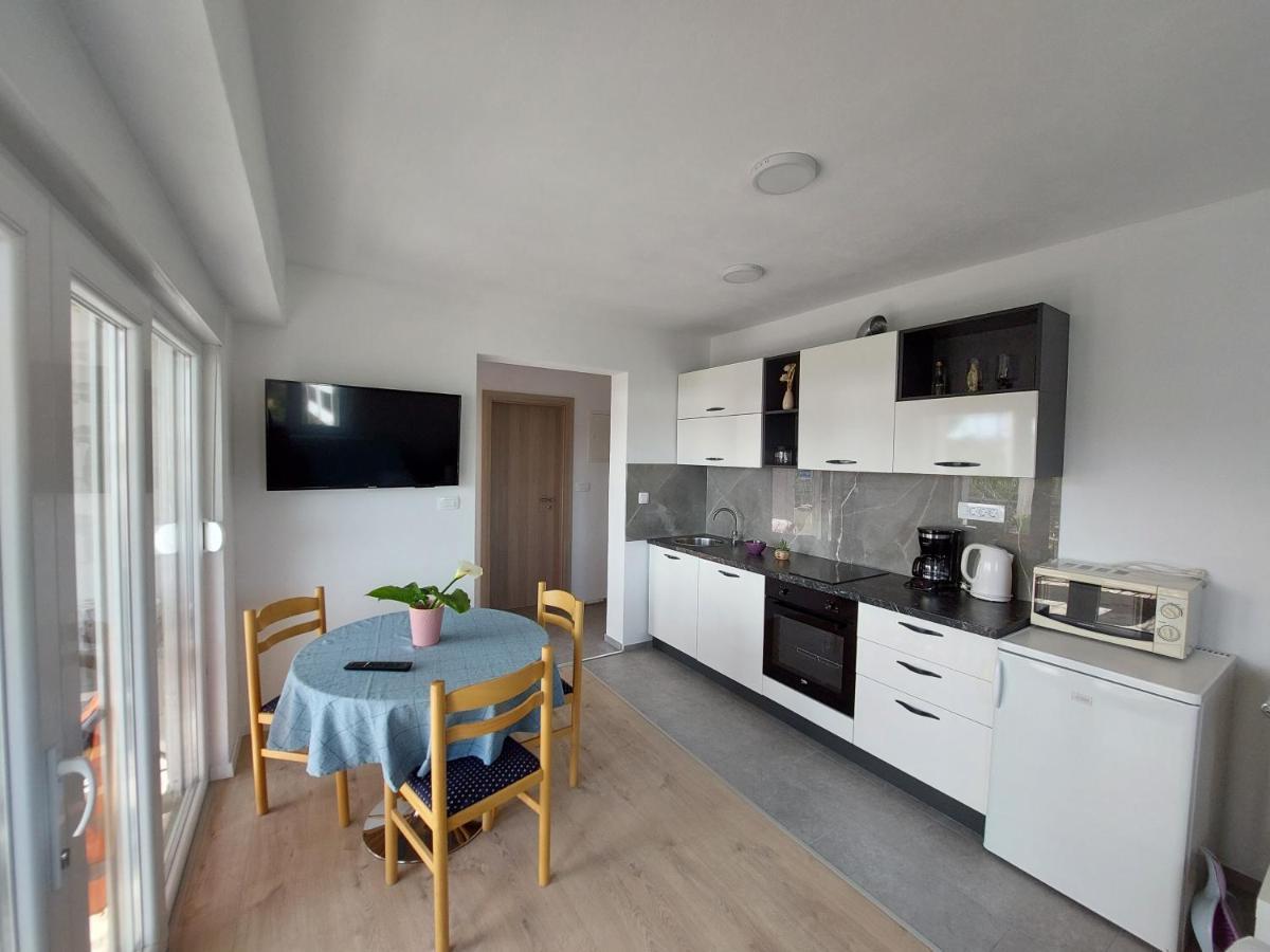 Apartments Babic โตรกีร์ ภายนอก รูปภาพ
